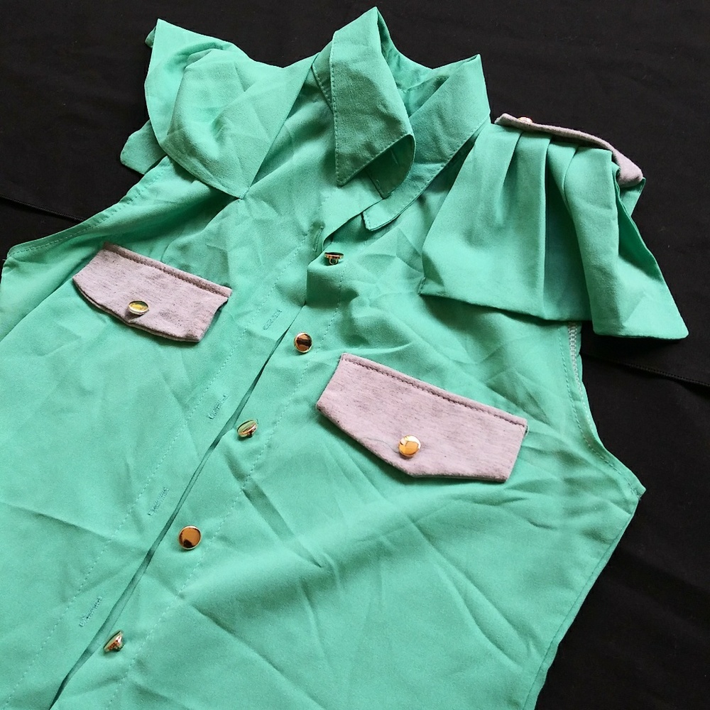 Edgy unique cap sleeve top with detailing